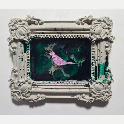 Pink bird on dark green